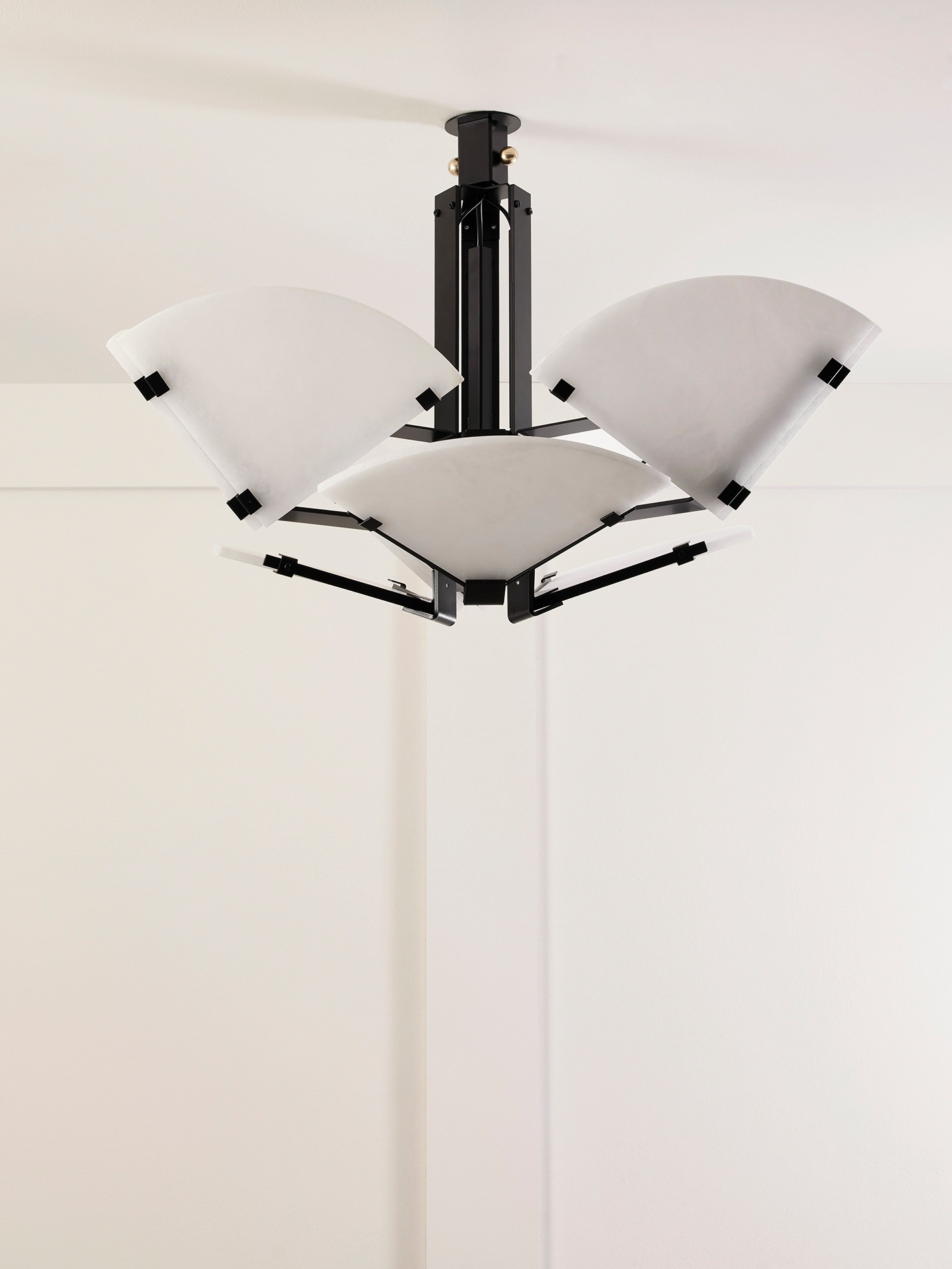 Mcde-sus-102a-001 | rewire Modern black metal ceiling light with four white curved shades arranged around a central stem