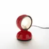 round orbital table light emodying the light of an eclipse by shifting the orb in either direction.