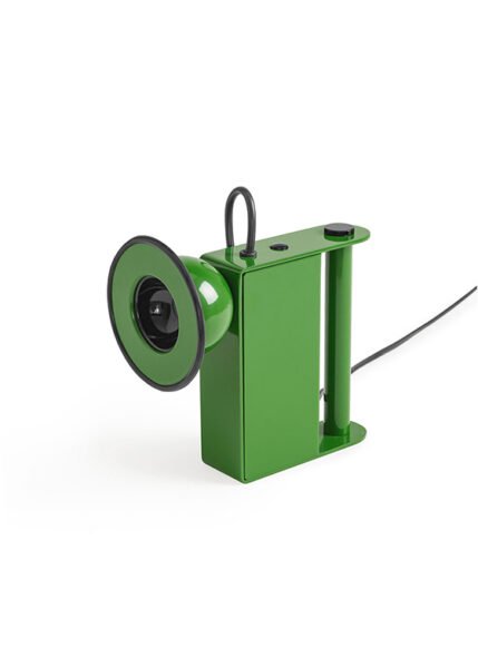 Small table light with a metal body a luminous eye that resembles a miner’s lamp.