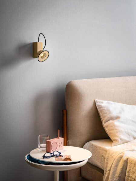 The Minibox sconce has a metal body and an adjustable luminous eye.