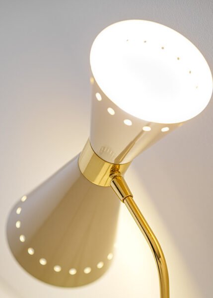 Iconic 1950s double-cone directable table lamp with both direct and indirect light.