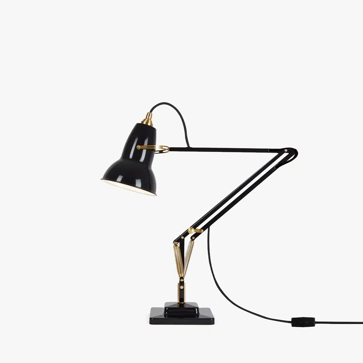 Original-1227-brass-desk-lamp-deep-slate-1jpg | rewire Black adjustable desk lamp with a gold-accented joint, mounted on a rectangular base and a long dual-arm structure (corded).