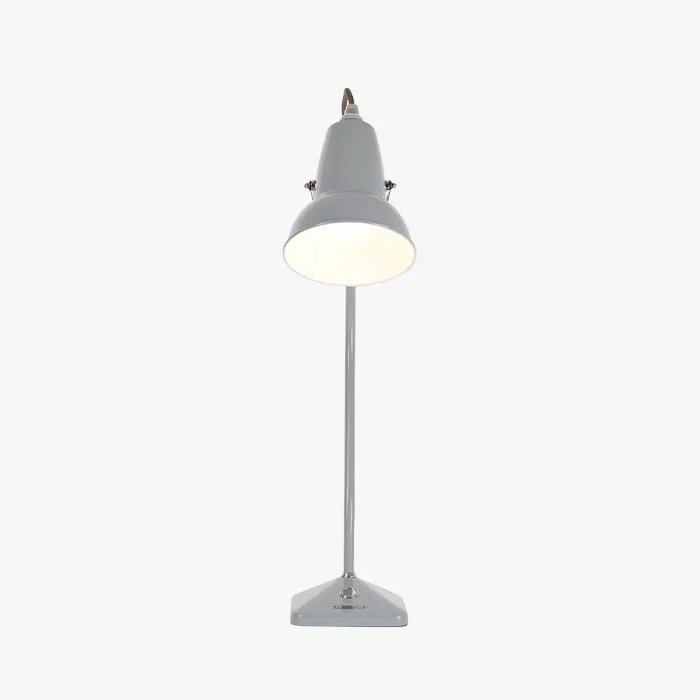 Original-1227-table-lamp-dove-grey-3jpg | rewire Silver desk lamp with a tall stem and rounded shade, lit against a white background (on).