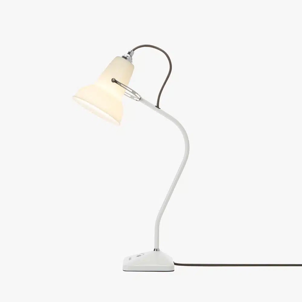 Original_1227_mini_ceramic_table_lamp_1jpg | rewire White adjustable desk lamp with a cream shade, curved neck, and black power cord on a white base.