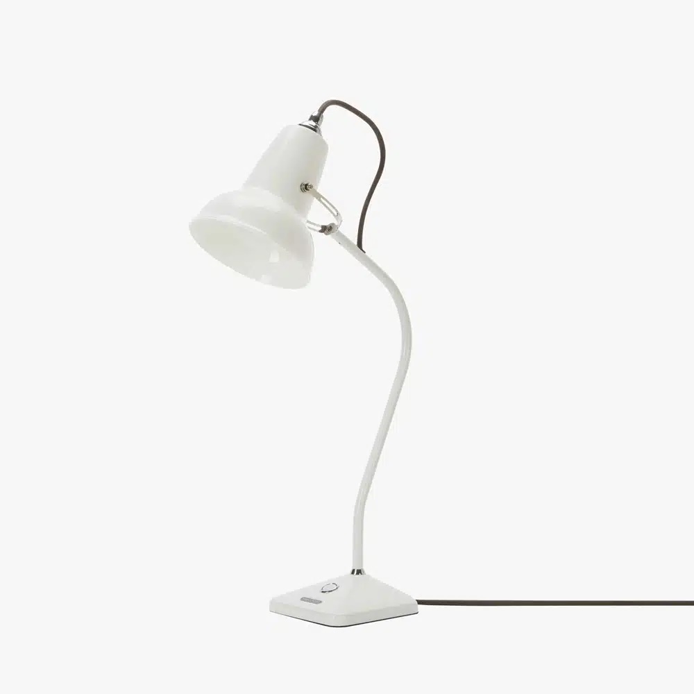Original_1227_mini_ceramic_table_lamp_2_offjpg | rewire White adjustable desk lamp with a curved neck and footswitch on a white base, plugged in by a long cord